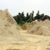 Sand piles on the Gale Briggs Inc property